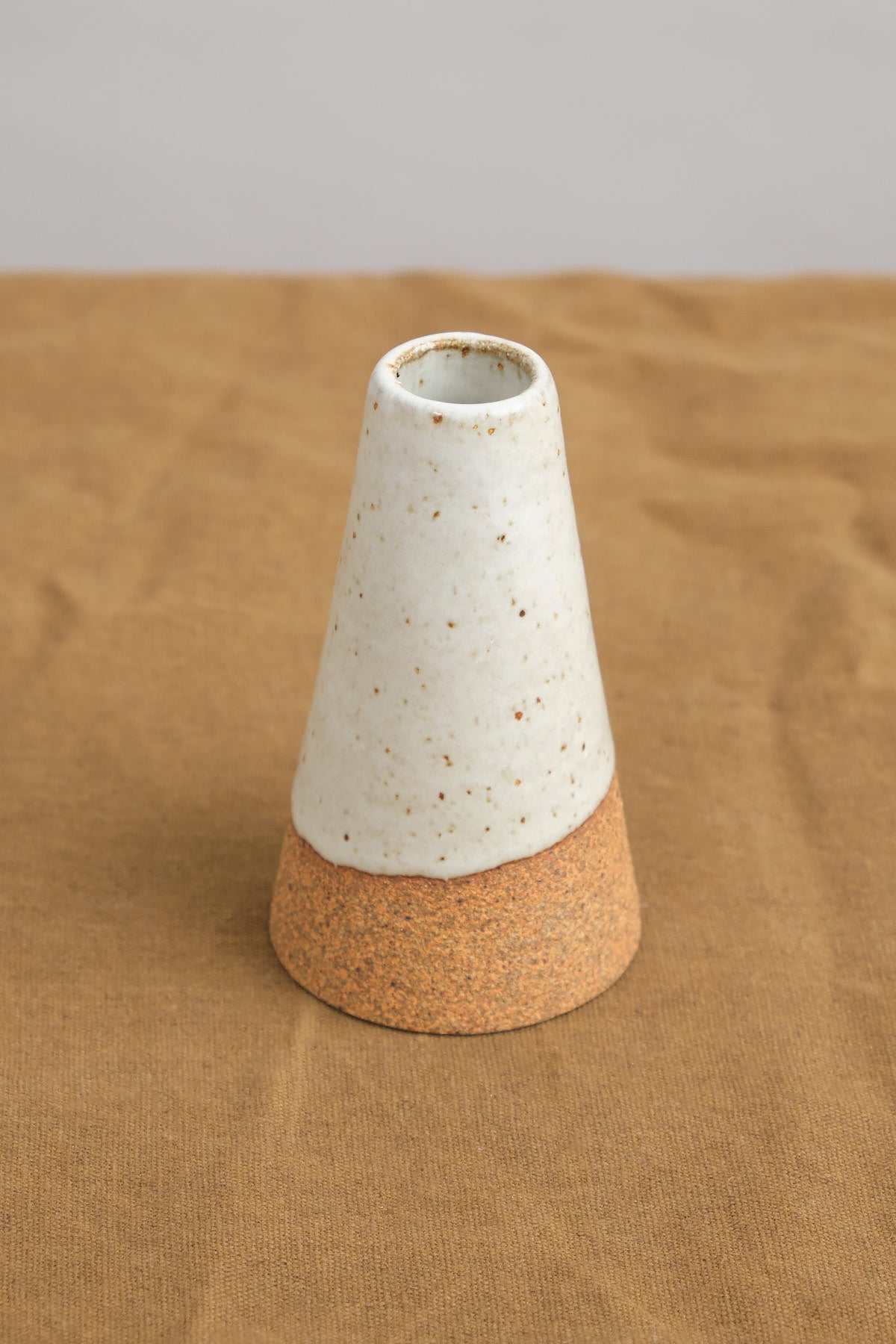 Hand-crafted Sandstone ceramic tapered vase.