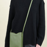 Roseto Crossbody Bag in Cipresso on the body