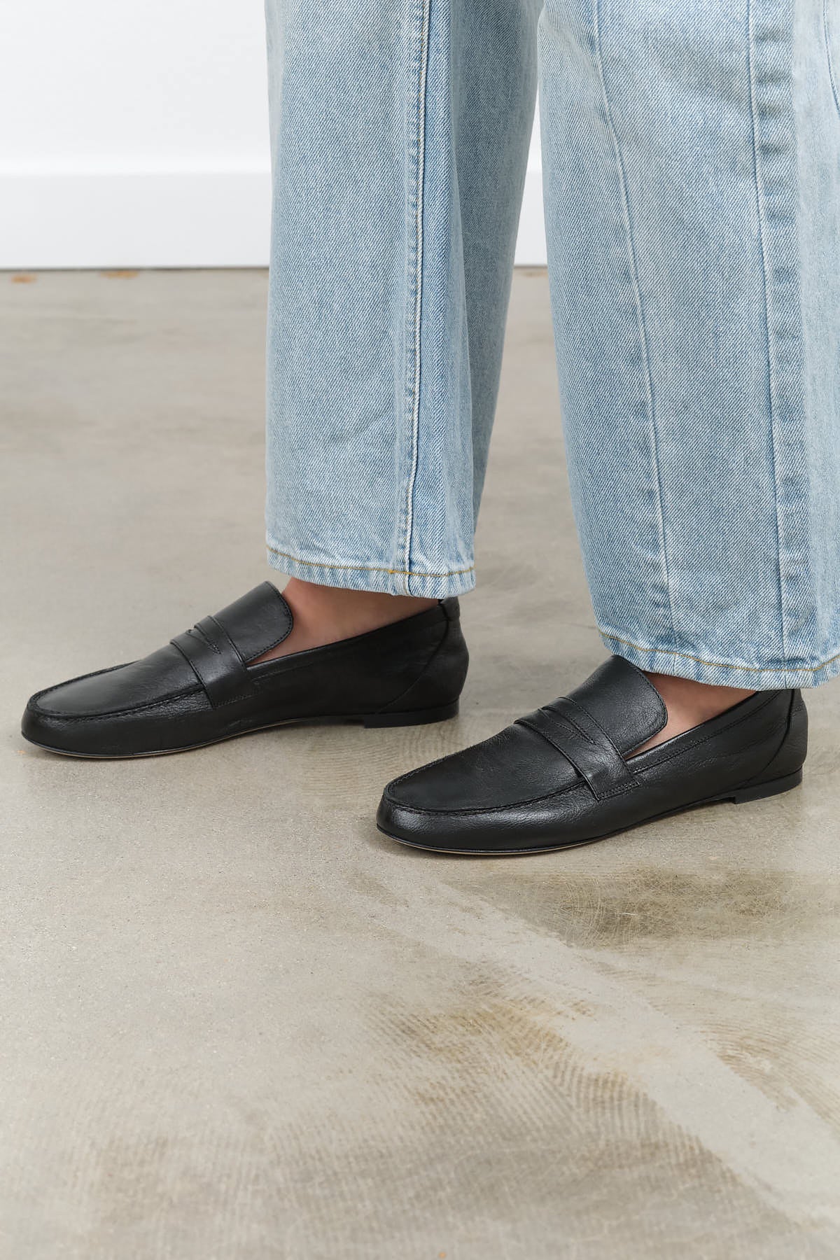 Side view of Penny Loafer in Black