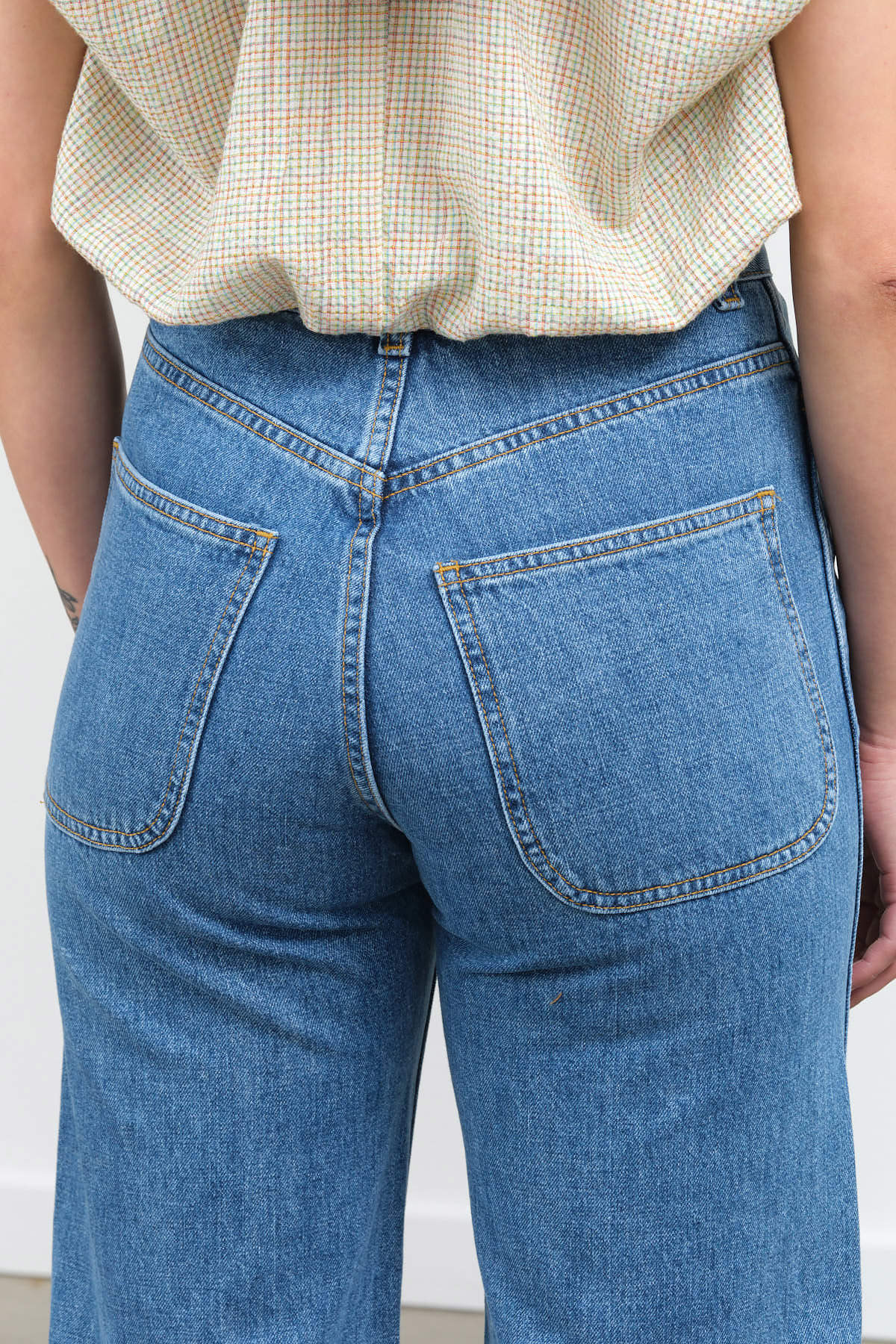 Rear pocket view of The 225 in Cowboy Blue Denim
