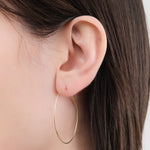Kathleen Whitaker Jewelry Earrings Medium Hoop Earrings 14K Yellow Gold / Pair