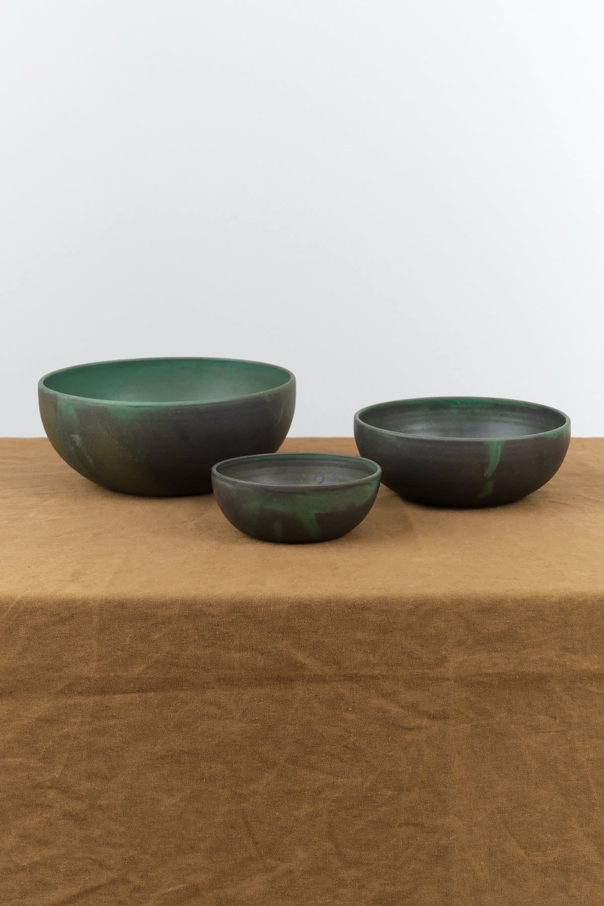 Front view of Nesting Kitchen Bowls in Emerald