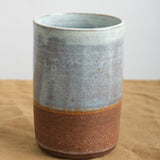 Kati Von Lehman Tumbler in Brownstone with natural base and  Shino glaze on top  