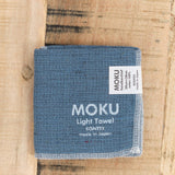 Kontex Home Bath Textiles Moku Light Washcloth in Turquoise Blue Turquoise Blue / 11.25" L X 11.25" W