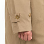 Bronze Tan Brown Long Sleeve Button Up Mile Trench Coat with Collar and Pockets by Kowtow Designer Brand