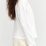 Kowtow Designer Brand Cotton Long Sleeve Mock Neck Reflect Top in Off White