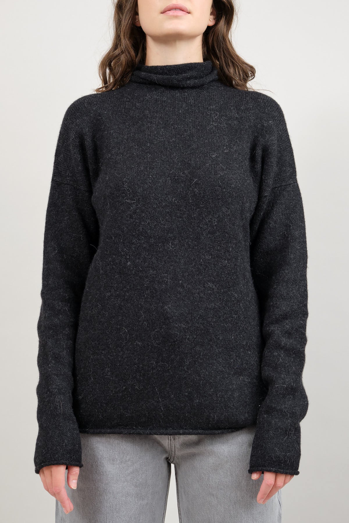 Front of Soft Funnel Sweater in Black Melange