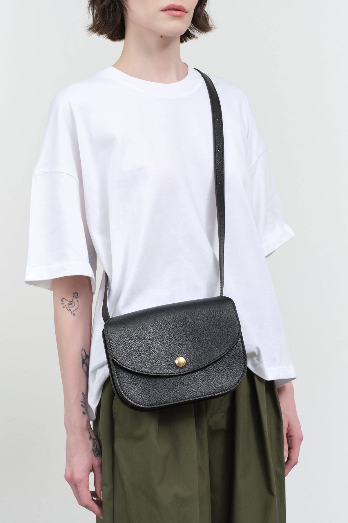Over the shoulder view of Po Bag in Black