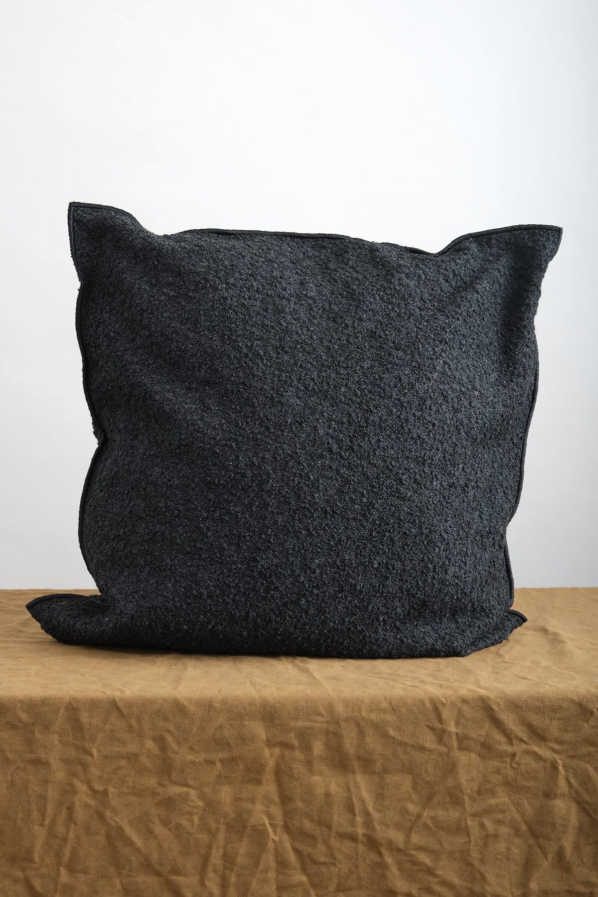 26 x 26 Canvas Wooly Pillow in Charbon