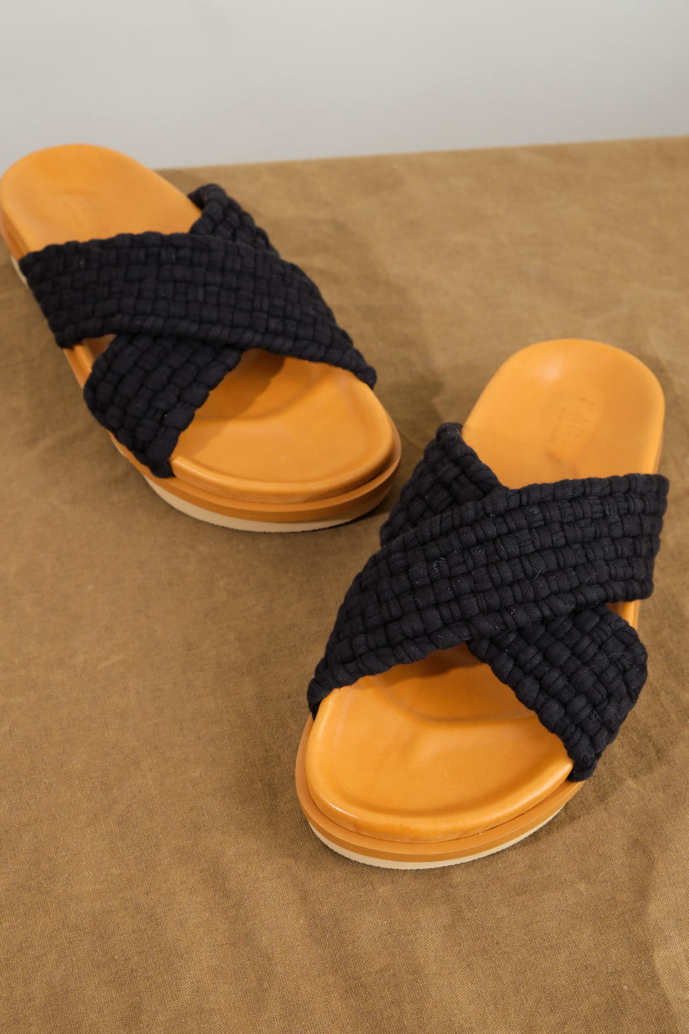 Front of Crossover Wave Sole Sandal in Black/Mustard