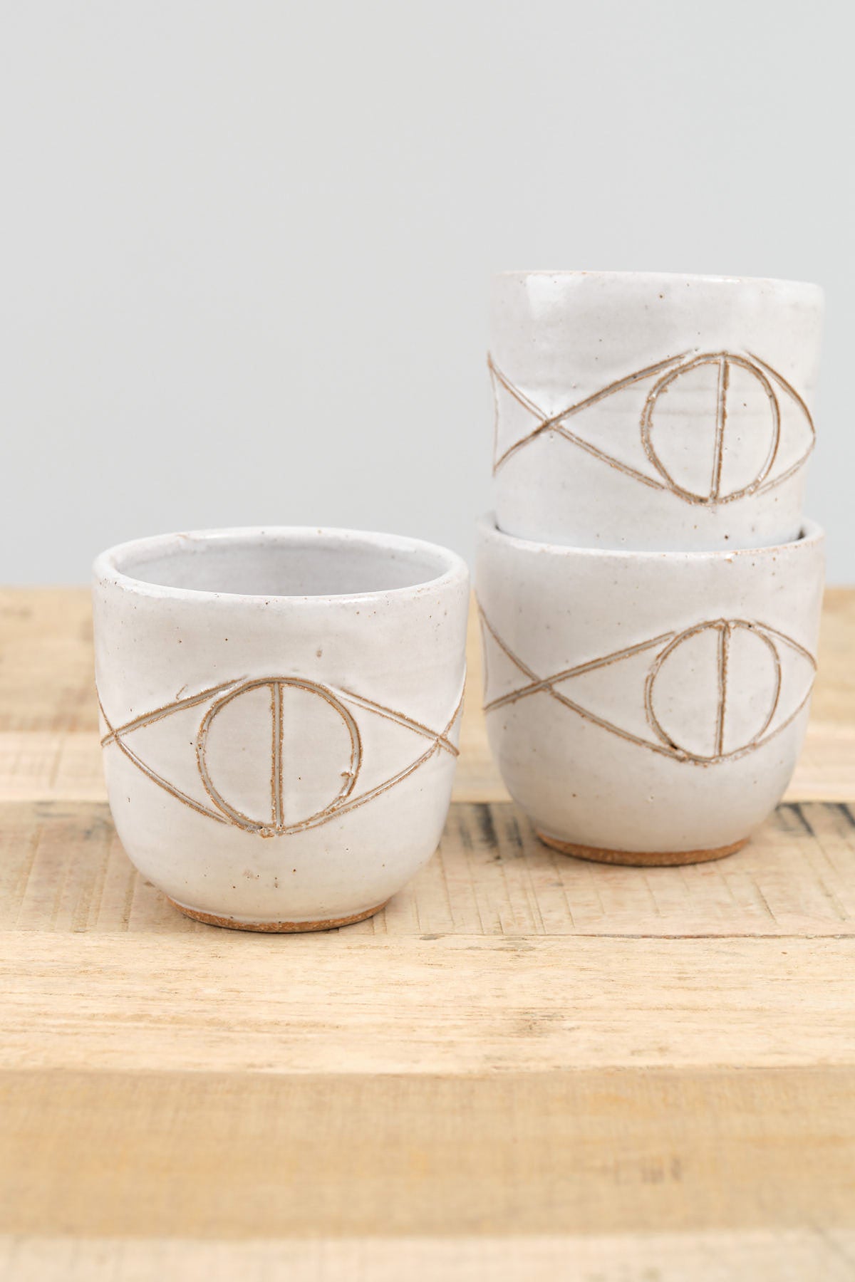 Matthew Ward Studio Handmade Ceramic Felix Cup with Carved Eye in White Glaze