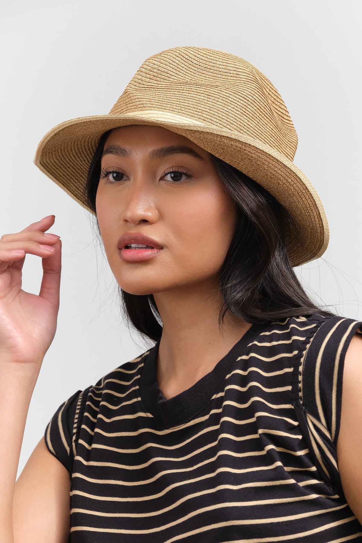 Styled view of Boxed Hat with Switch Brim in Beige