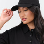 Side view of Trainer Cap in Black