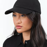 Front view of Trainer Cap in Black
