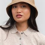 Styled view of Waterproof Paper Braid Switch Brim Short Hat