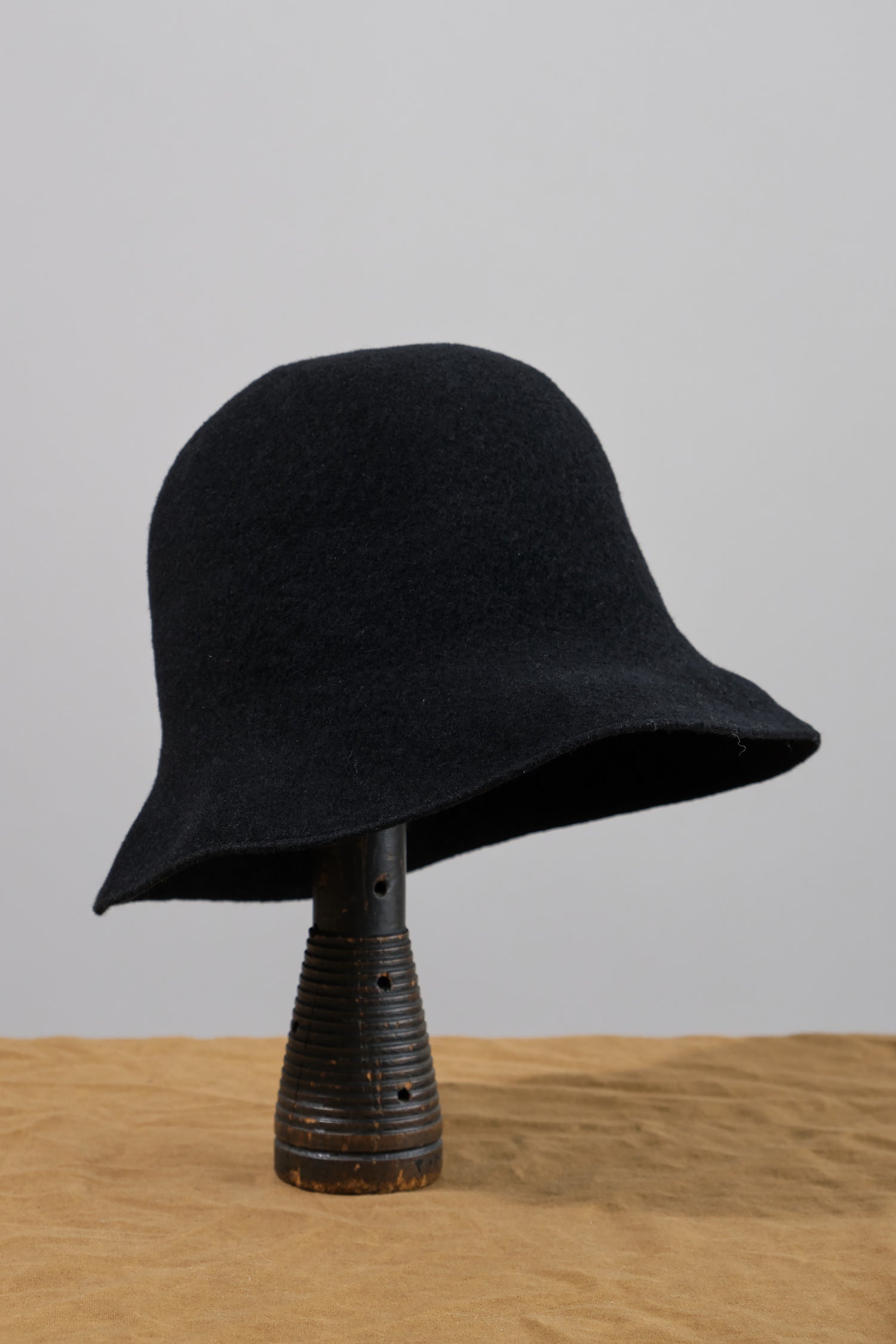 Widen Bell Hat in Black on stand