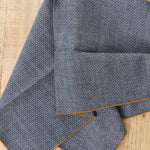 Dobby Chambray Napkin in O'Keefe Cedar Brown and Blue by Mi Cocina