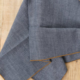 Dobby Chambray Napkin in O'Keefe Cedar Brown and Blue by Mi Cocina