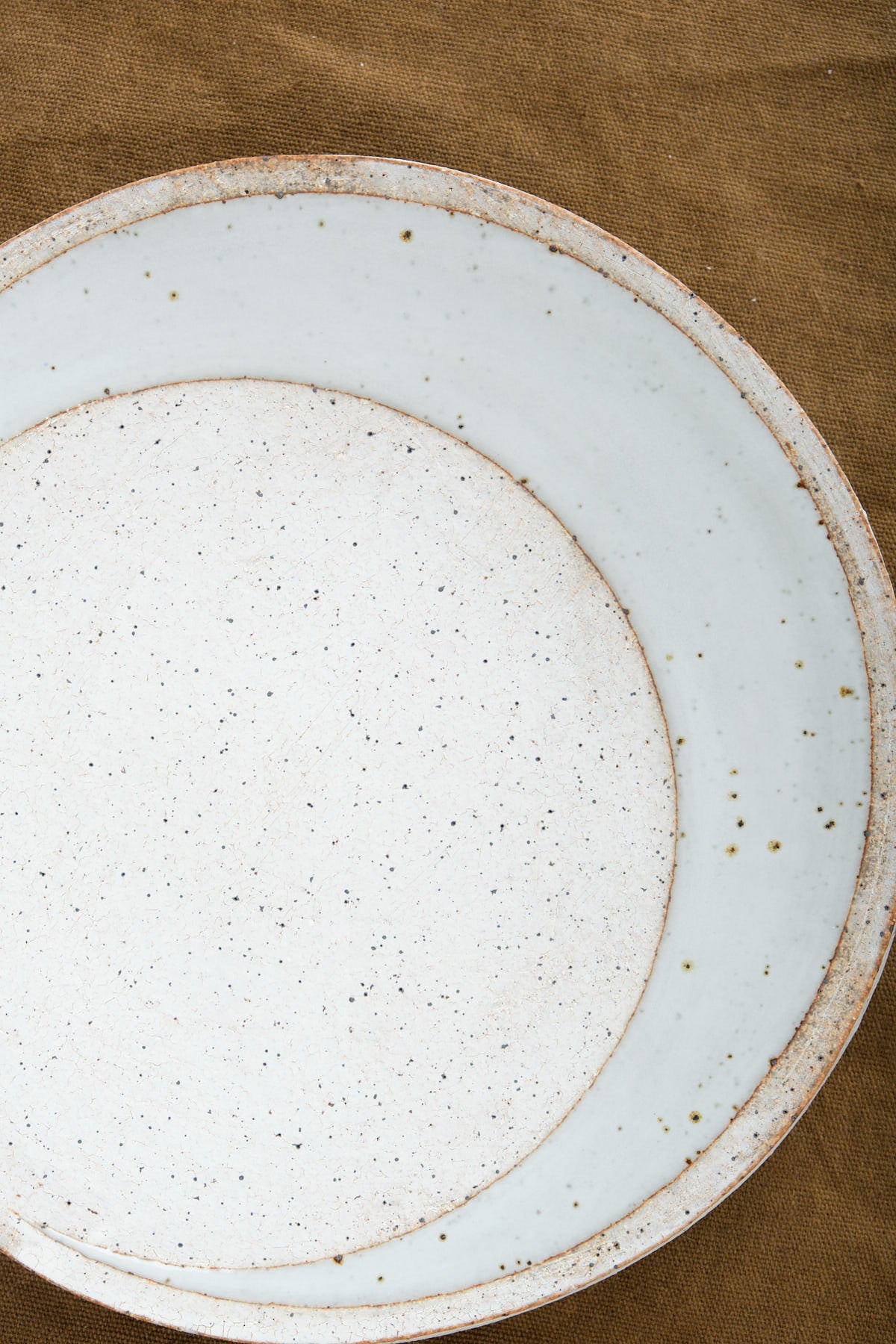 MQuan Crescent Dish with speckled detailing 