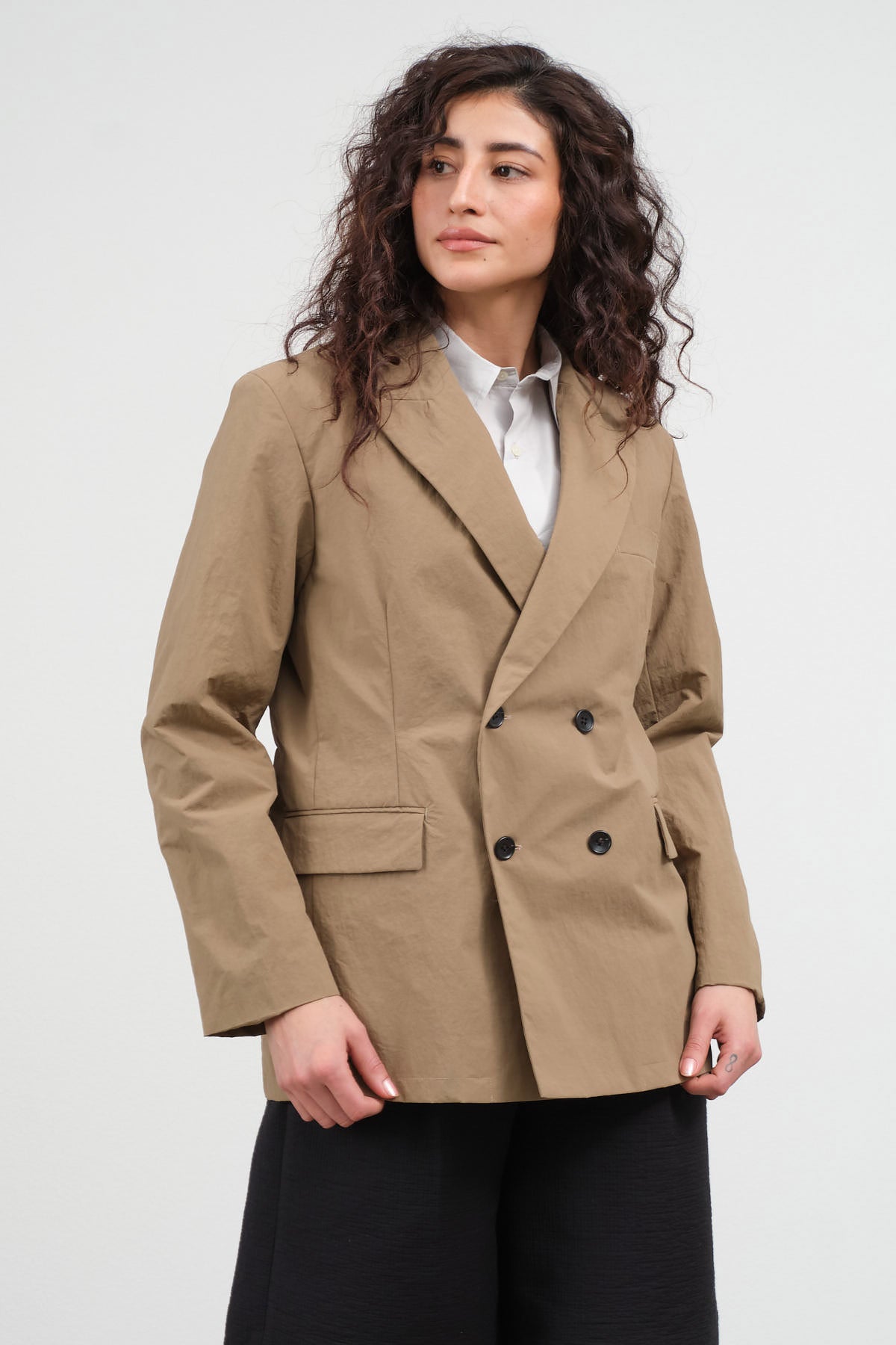 Styled angled view of Essential Jacket
