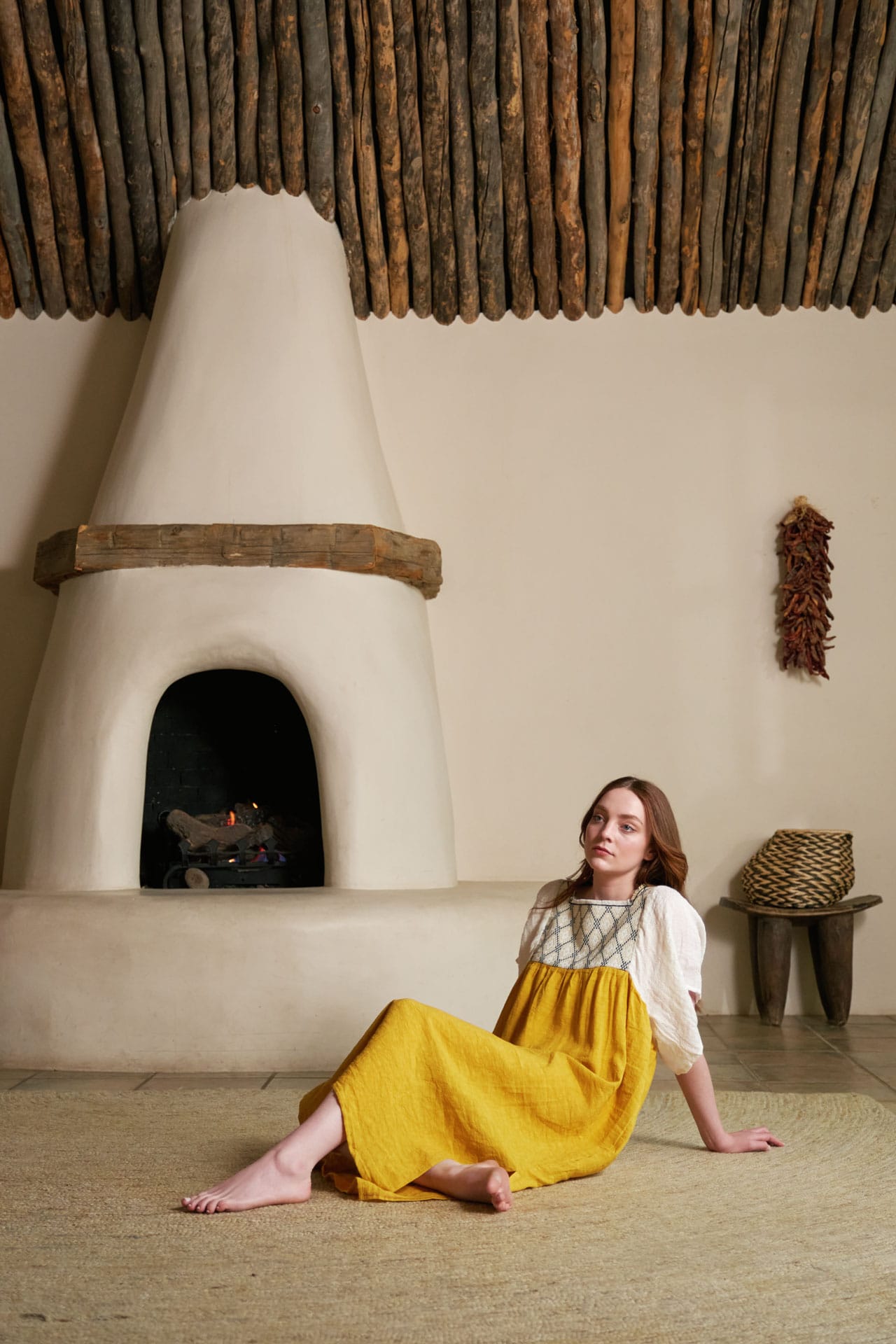 Woman in a summer dress from Ninalueca visiting Santa Fe, NM.