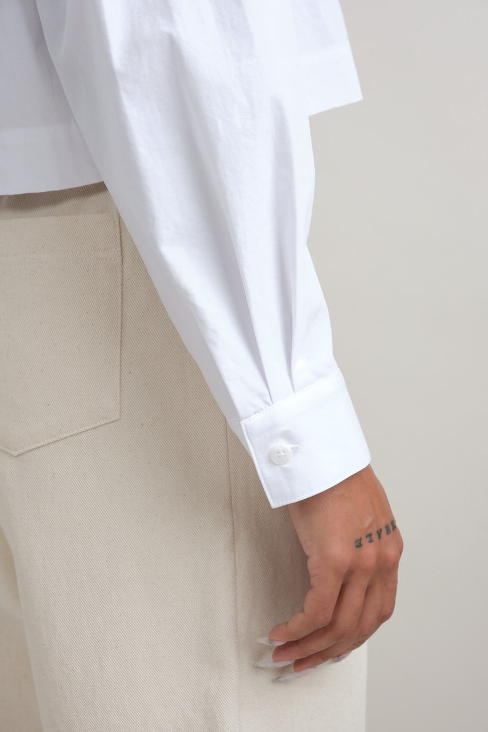 Sleeve cuff on Ava Top in White