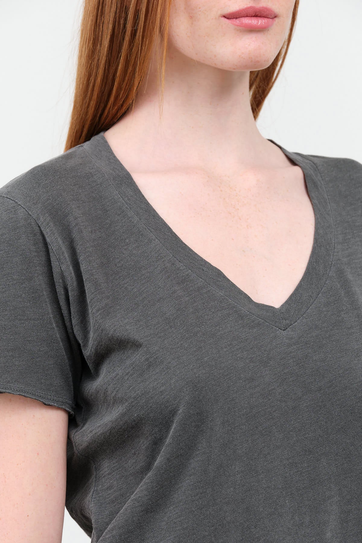 Collar view of Cora V Neck Tee in Pigment Black