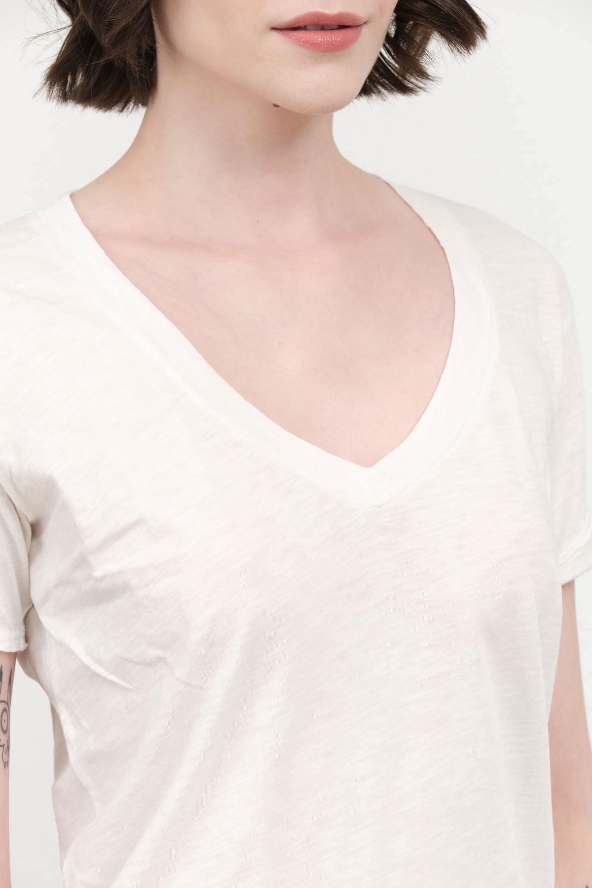 Collar view of Cora V Neck Tee in Soft White