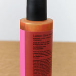 Back view of Lustero Glow Body Oil