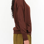 Paychi Guh Designer Brand Relaxed V-Neck Button Up Cardigan with Pockets in Star Anise Red Brick