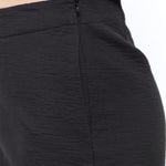 Side zipper view of Roa Pant in Black