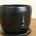 Close up of Face Pot Set in Black