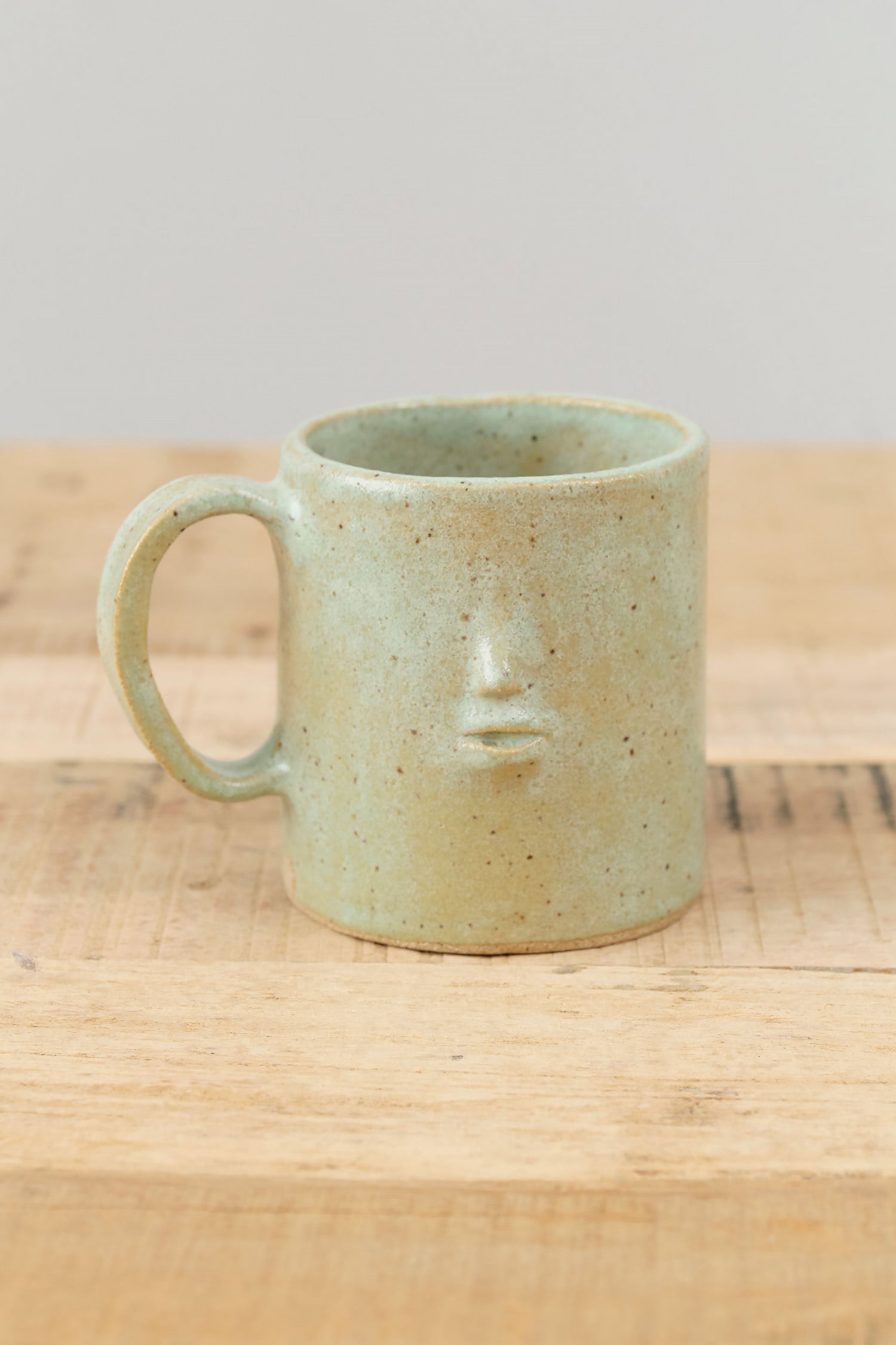 Small Mini Face Coffee Mug by Rami Kim Studio in Honey Dew 