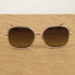 Rhine Sunglasses on table