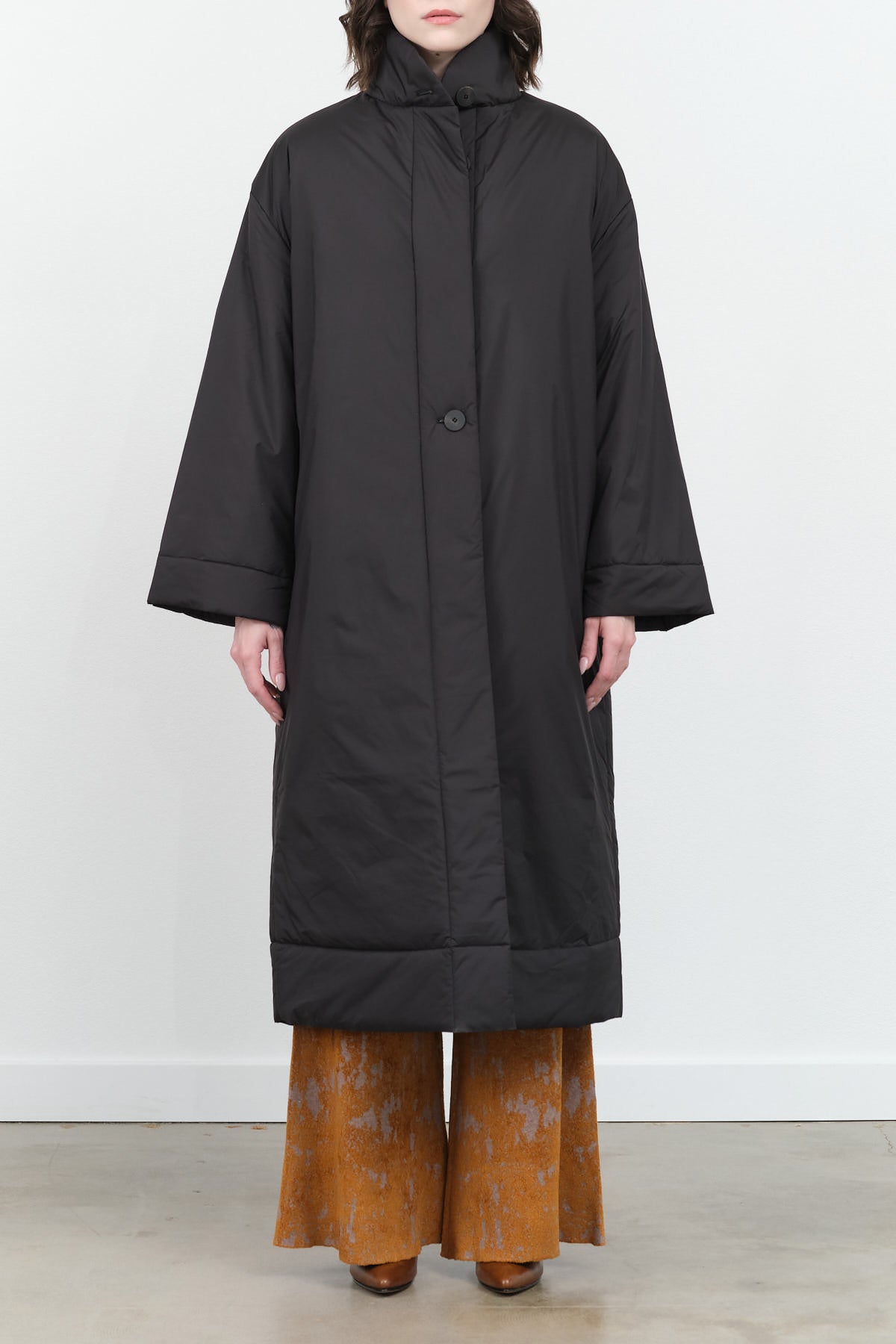 Pallan Padded Long Coat in Black by Studio Nicholson