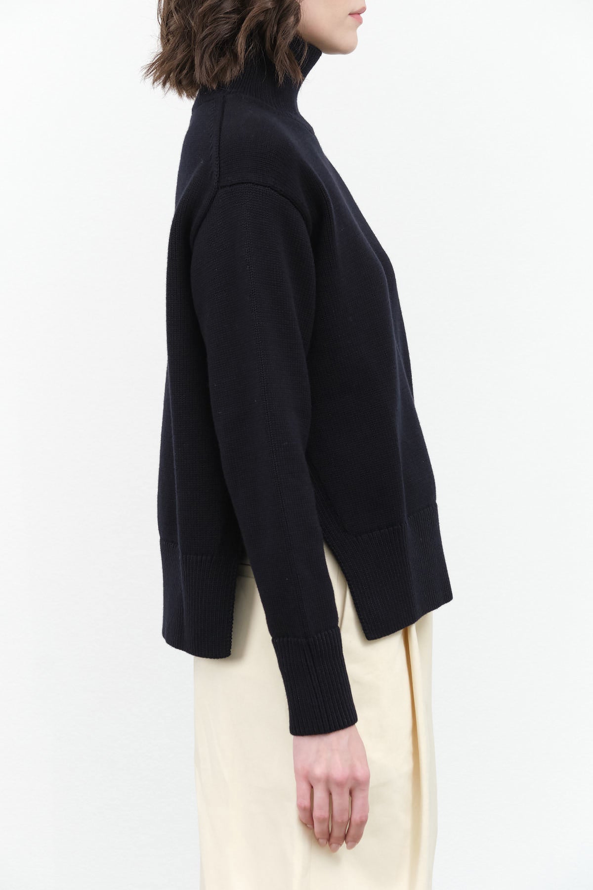 Designer Brand Studio Nicholson Patria Roll Turtle Neck Sweater with Slit in Dark Navy Blue