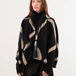Suzusan Apparel Womens Outerwear Cashmere Seamless Upside Down Cape in Black/Sand Black/Sand / One Size