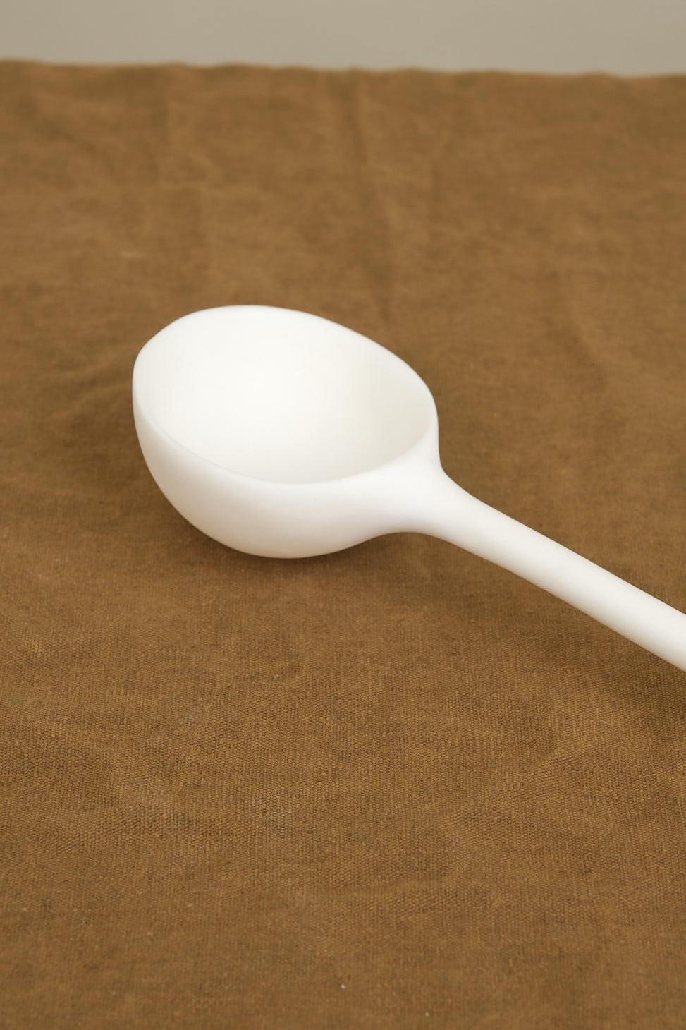 Bowl on Large Olive Spoon