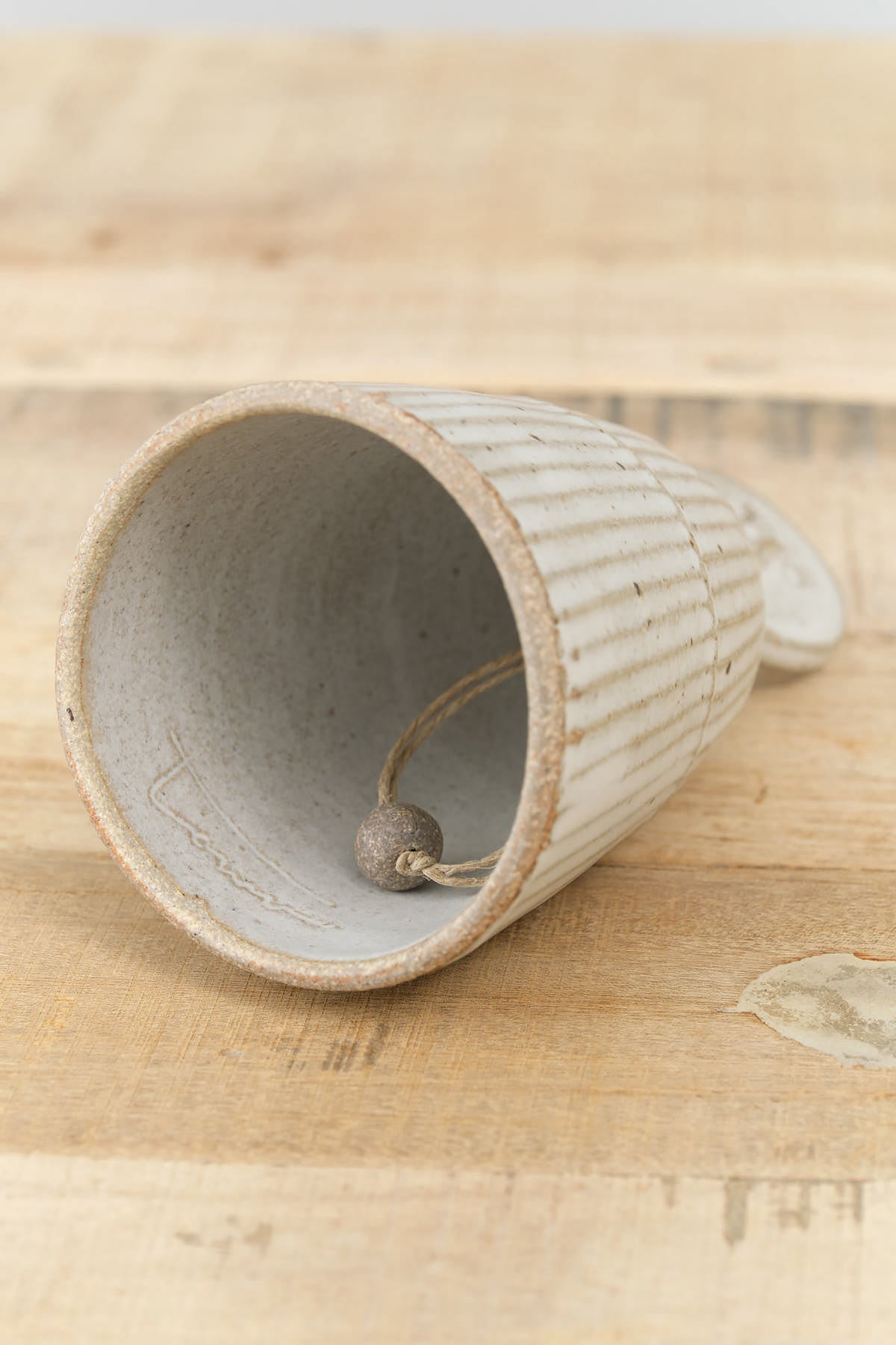 White Speckled Glaze Ceramic Medium Dinner Bell with Twine by Tomoro Pottery