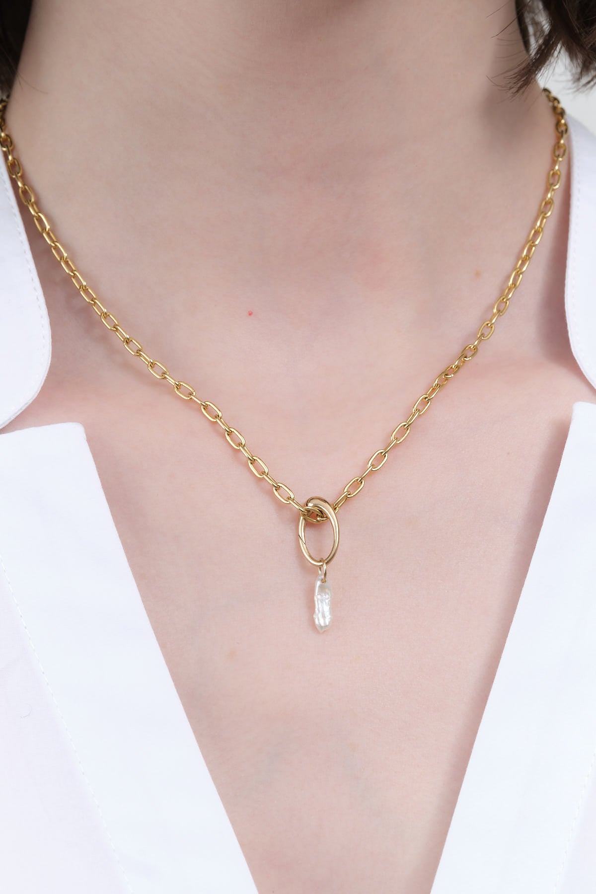 Pearl Charm Hanging from Gold Bail by WWAKE