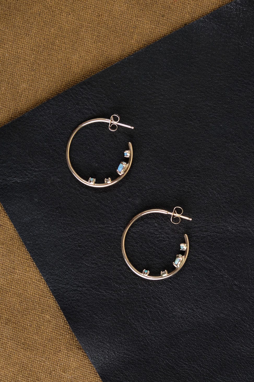 Inverted Hoop Earrings on table