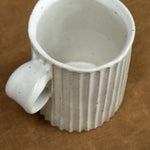 carved mug in white