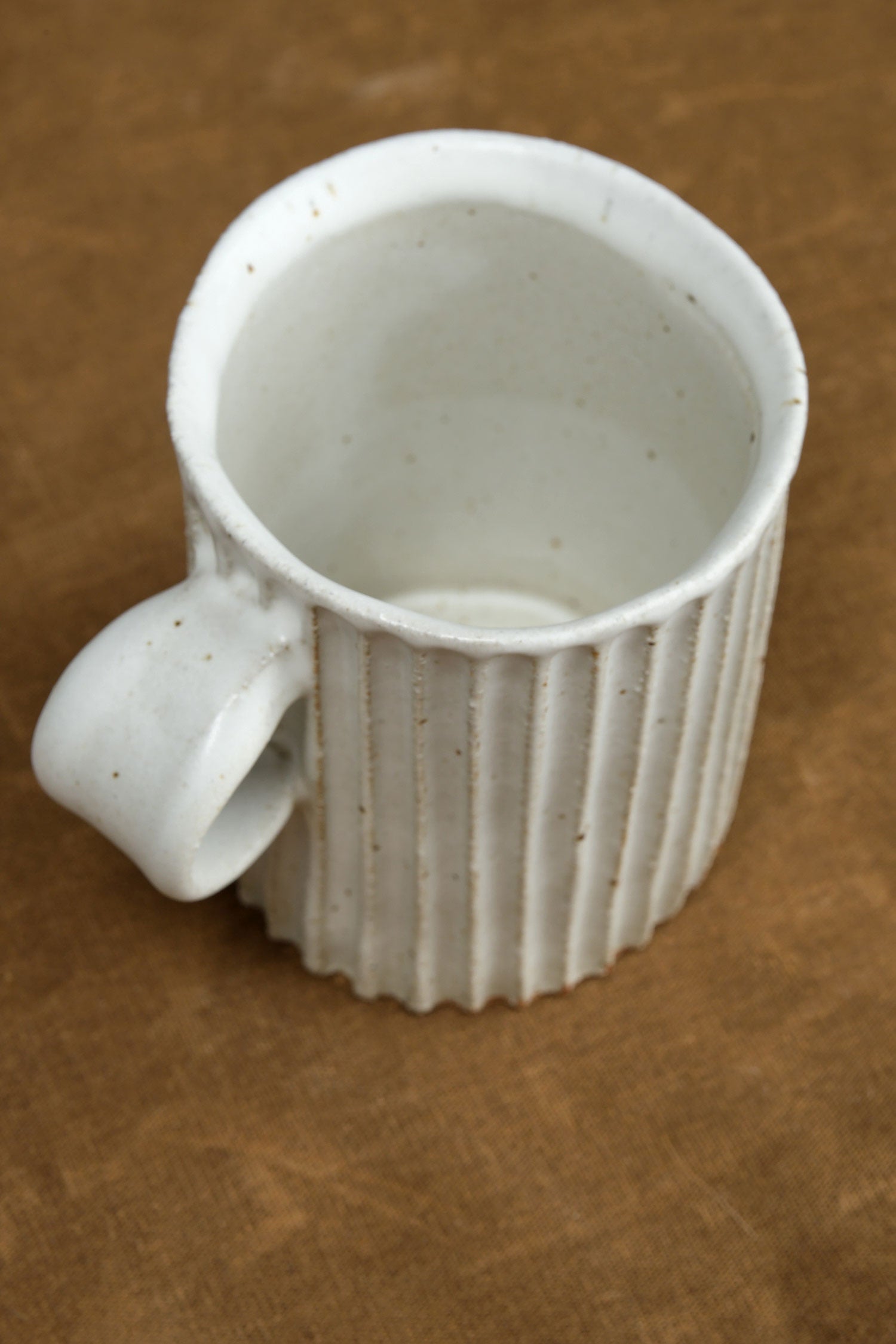 carved mug in white