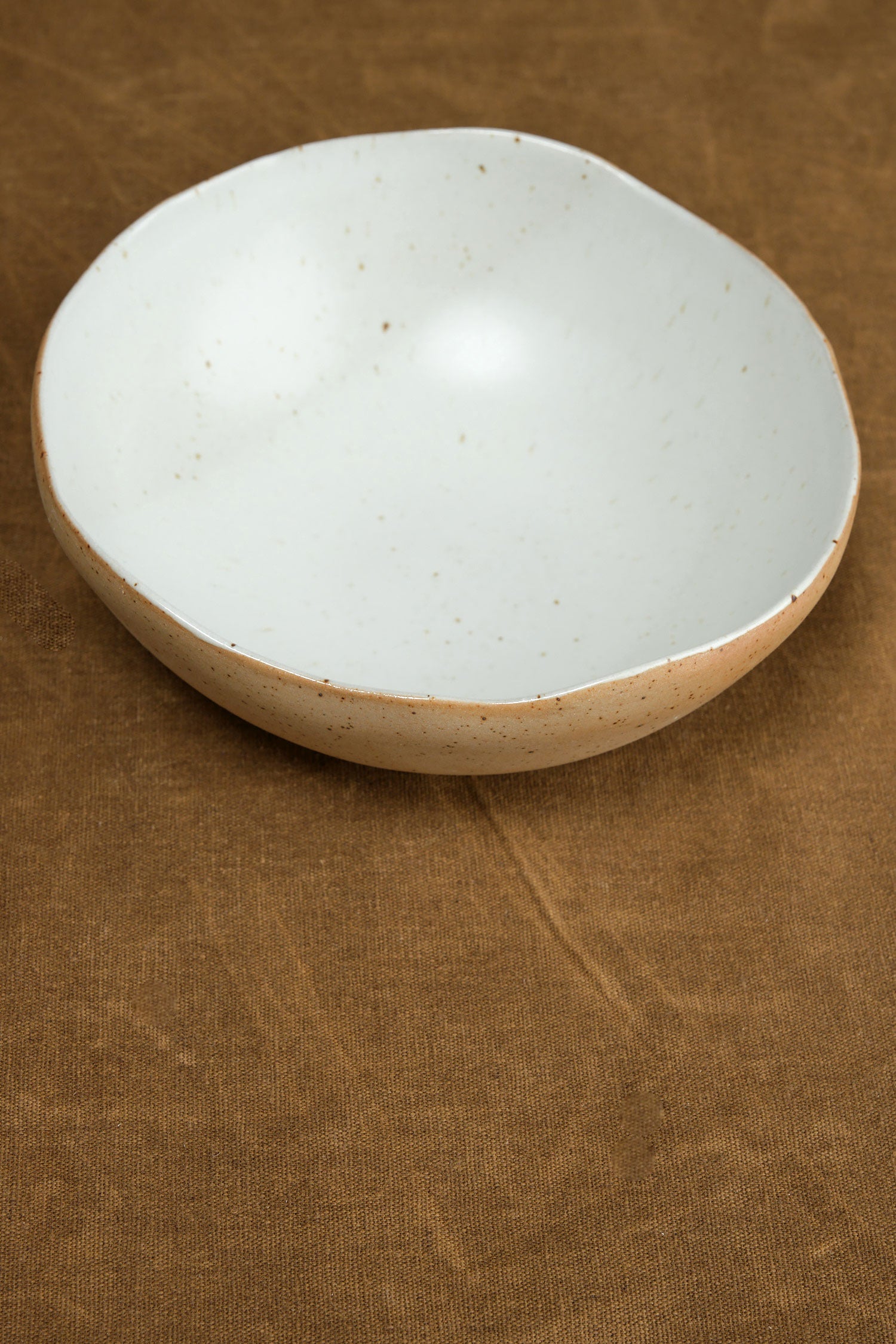 Naked red clay stoneware and white matte glaze