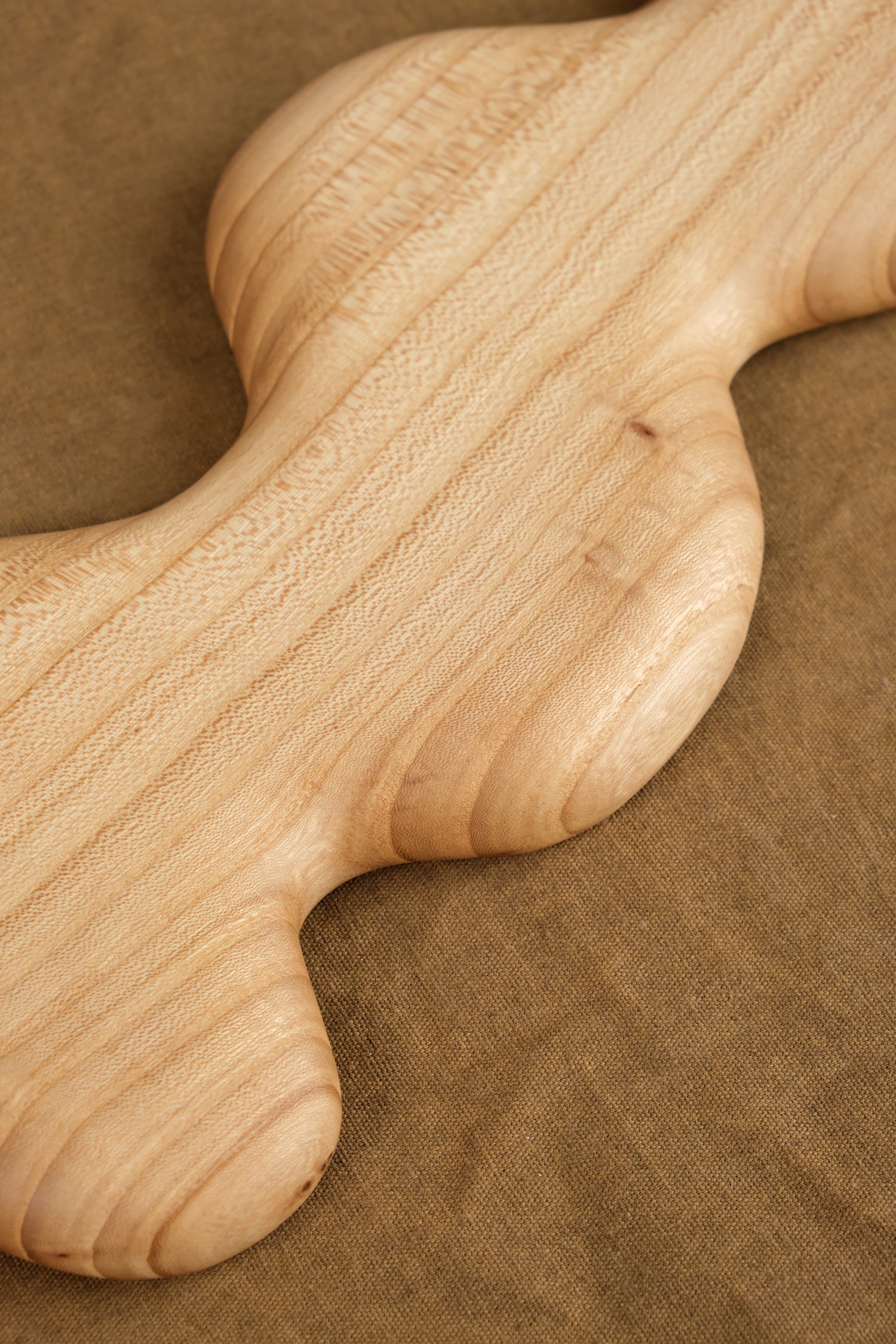 Close up of Squiggle Trivet in Elm