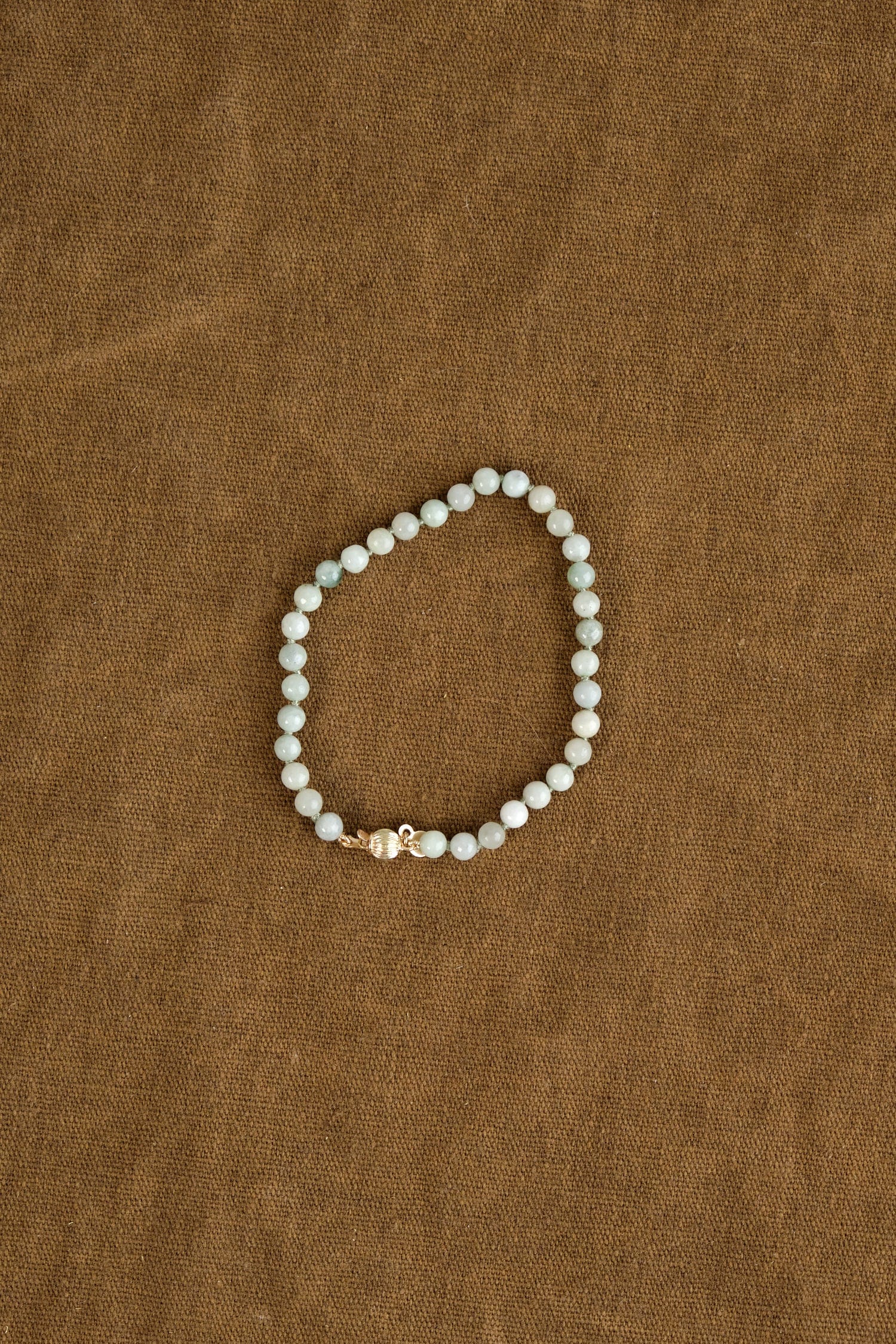 Jade Bracelet on table