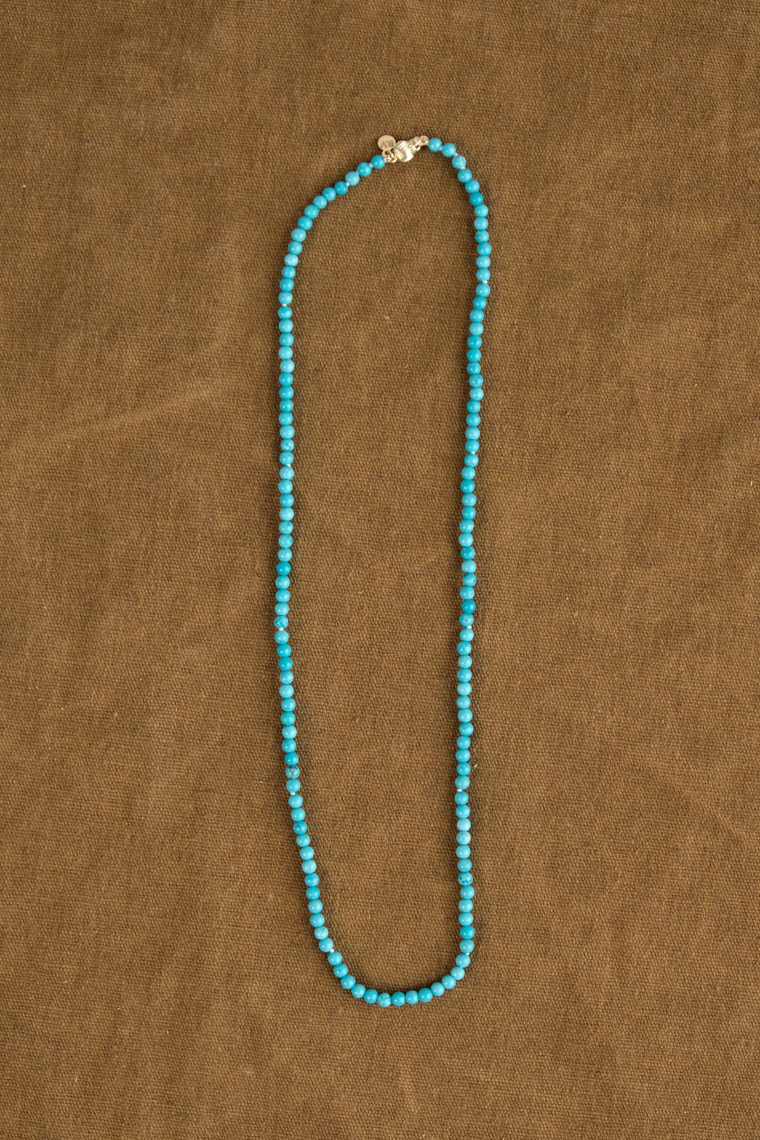 Turquoise Necklace on table