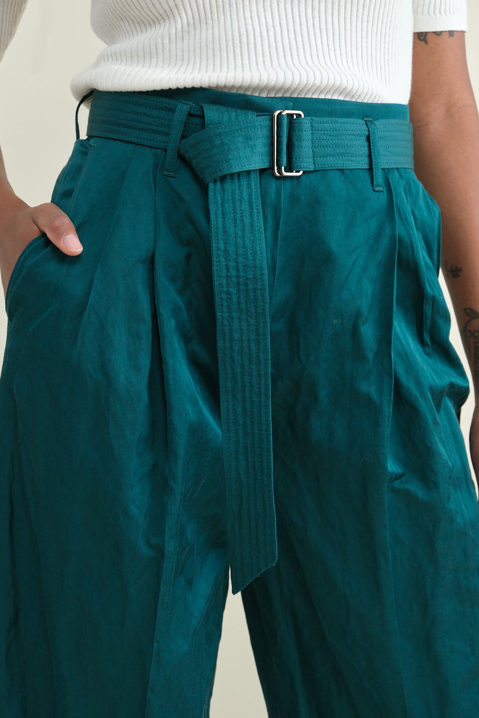 Belt and detailing on Pliza Pleated Trousers in Emerald