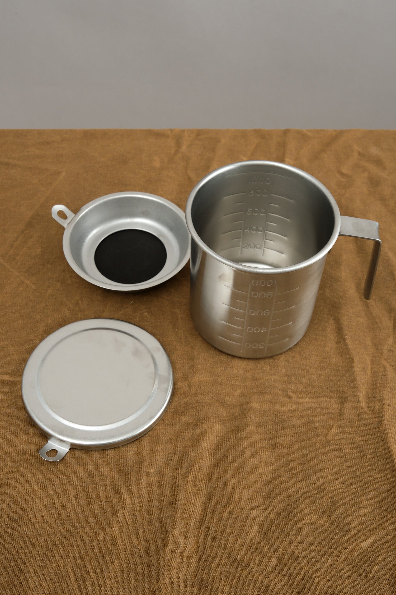 Oil Strainer and measuring cup