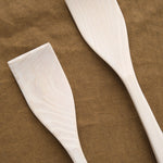 Tops of Crafted Salad Servers in White